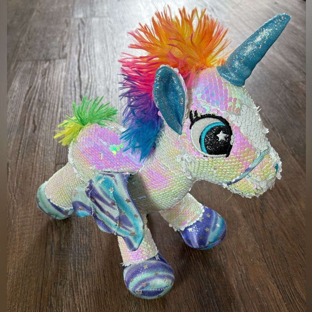 Athoinsu Unicorn Stuffed Animal Plush Reversible
Glitter Sequins